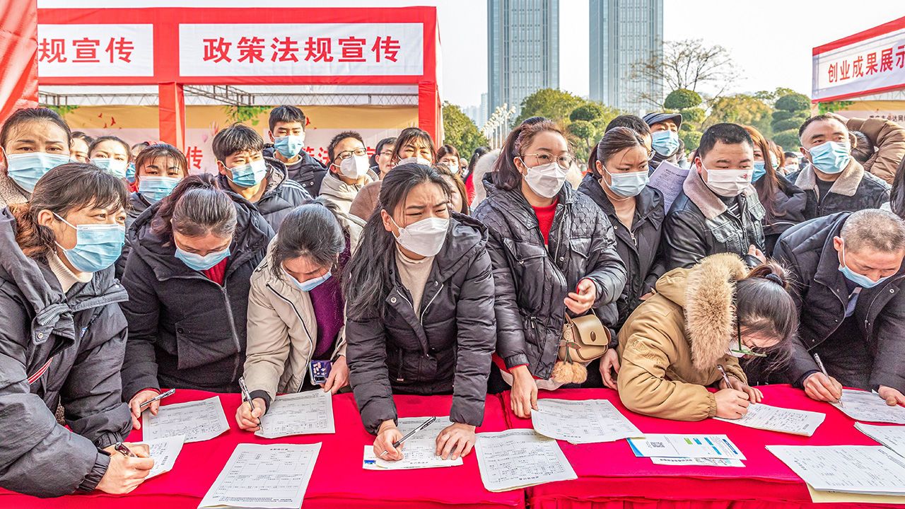 Crowds of job seekers attend a job fair in China.