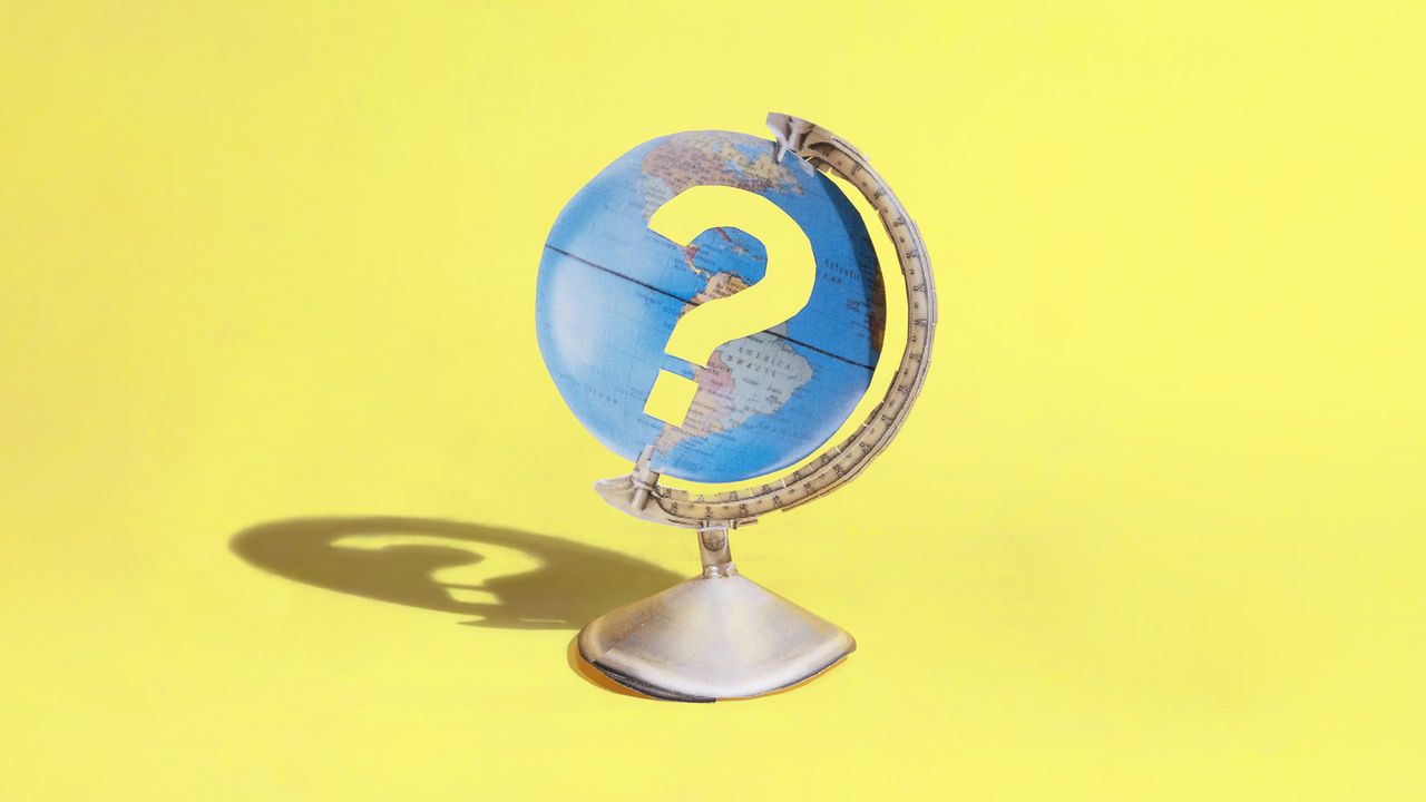 A globe with a question mark cut into it