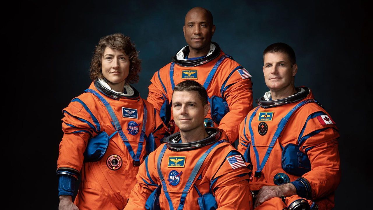 Astronauts Reid Wiseman, Victor Glover, Christina Hammock Koch, and Jeremy Hansen pose for a portrait.