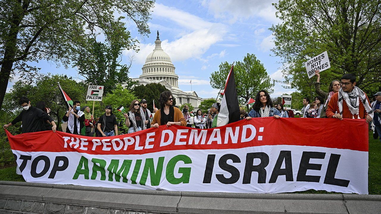 Pro-Palestinian demonstrators hold a rally outside the U.S. Capitol building.