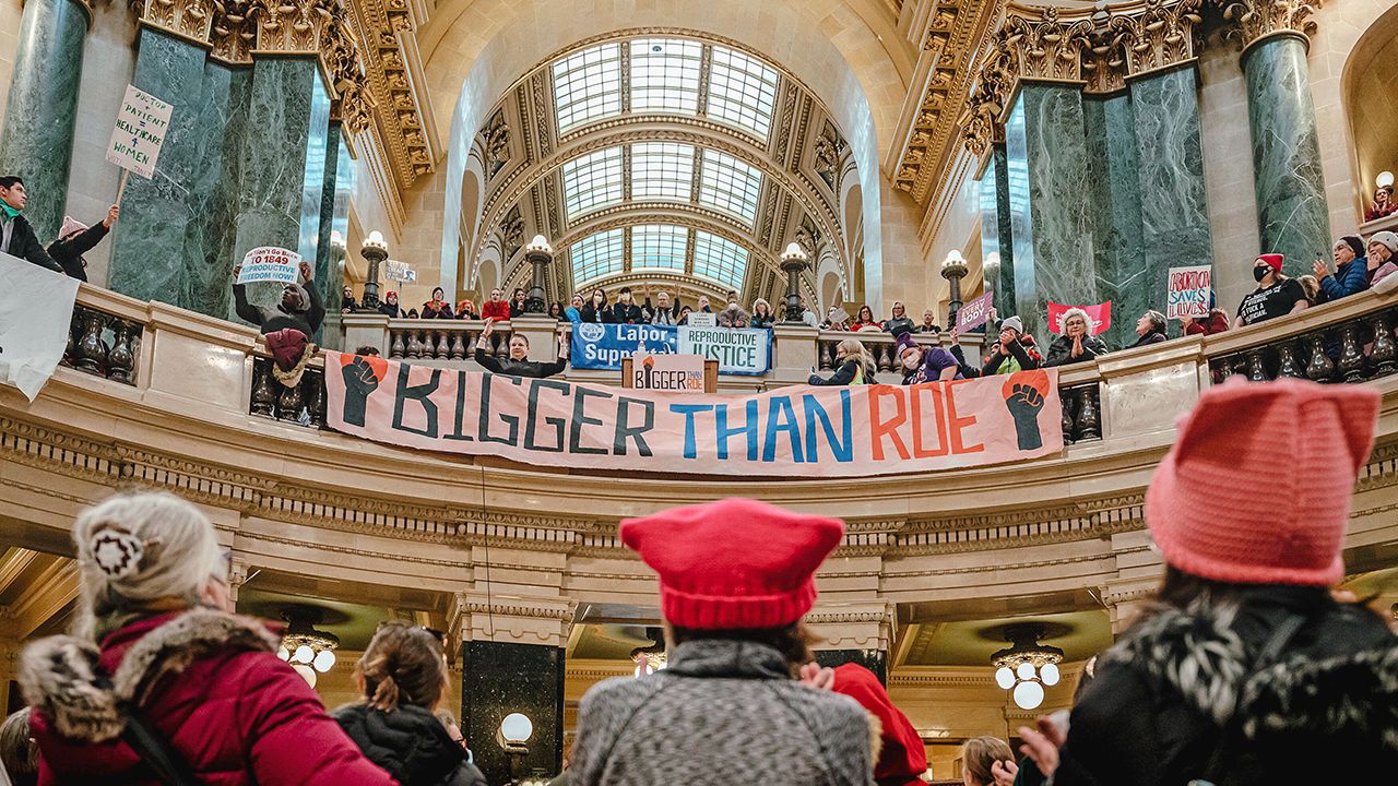 Abortion rights demonstrators in the rotunda of the Wisconsin State Capitol building in Madison in 2023