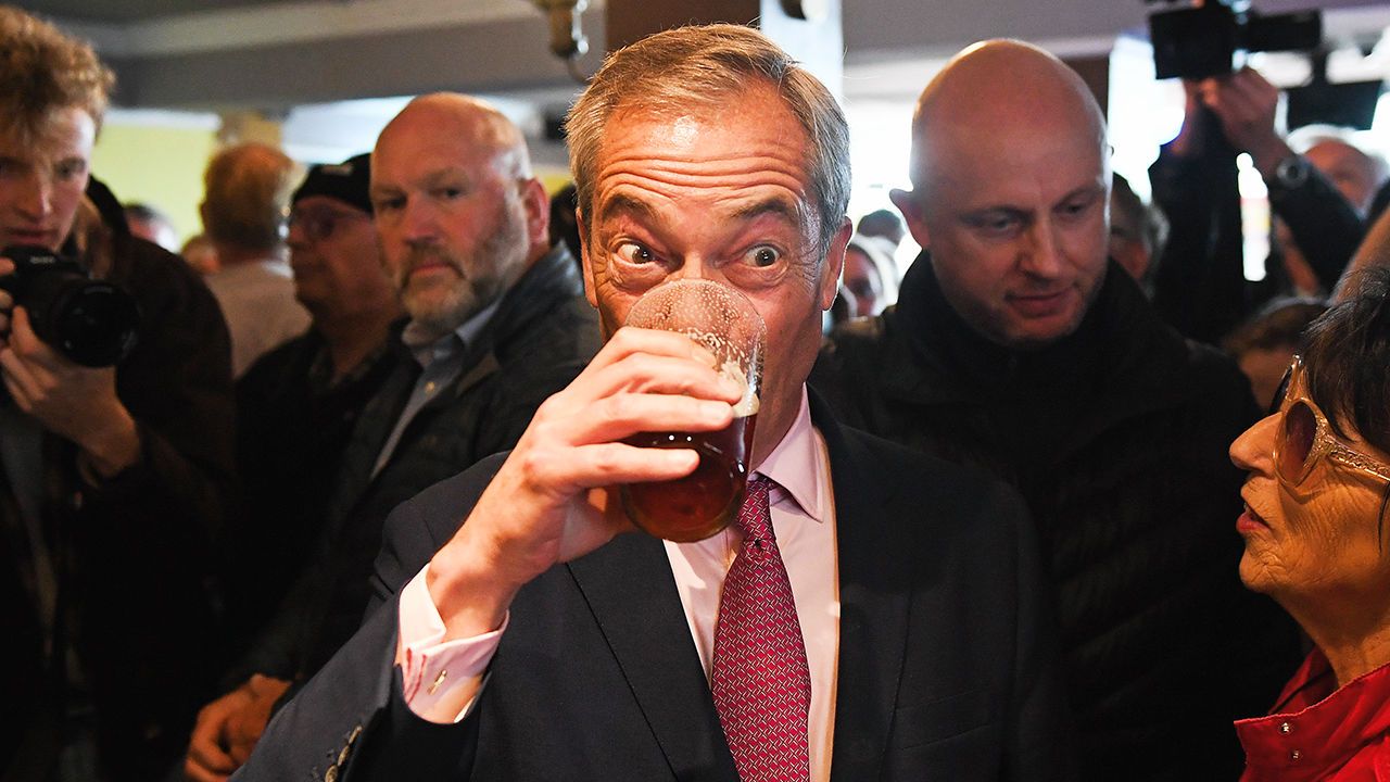 Nigel Farage, leader of Reform UK, at a pub.