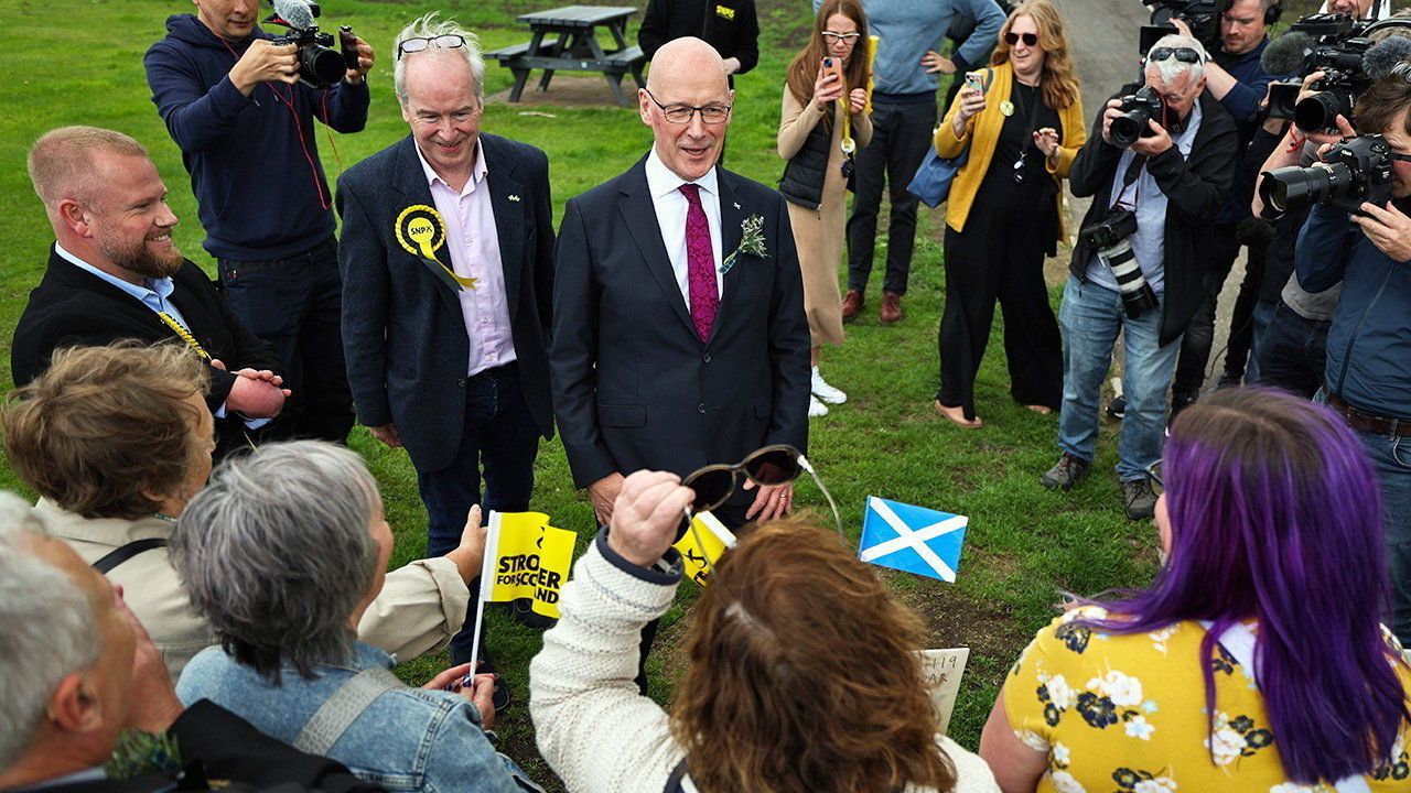 John Swinney, the leader of the Scottish National Party, joins activists on the campaign trail.