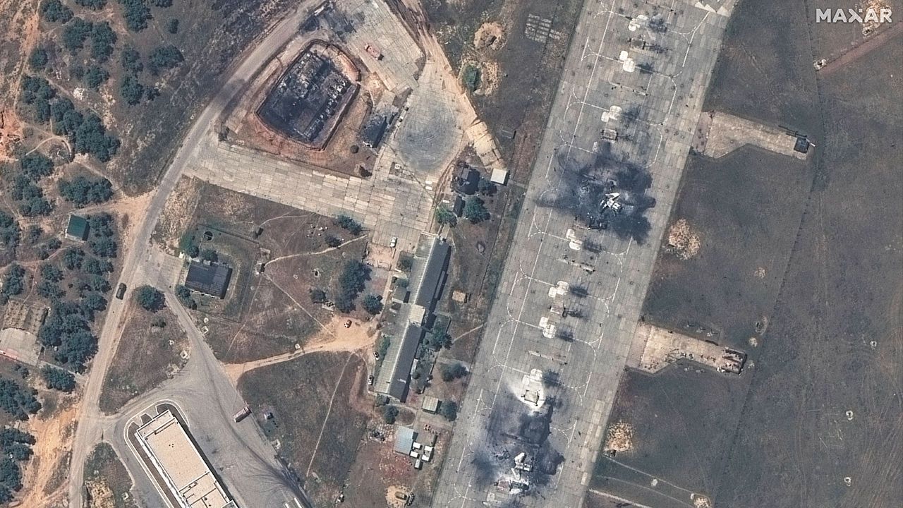 A satellite image of destroyed MiG31 fighter aircraft and fuel storage facility following an attack at Belbek Airbase