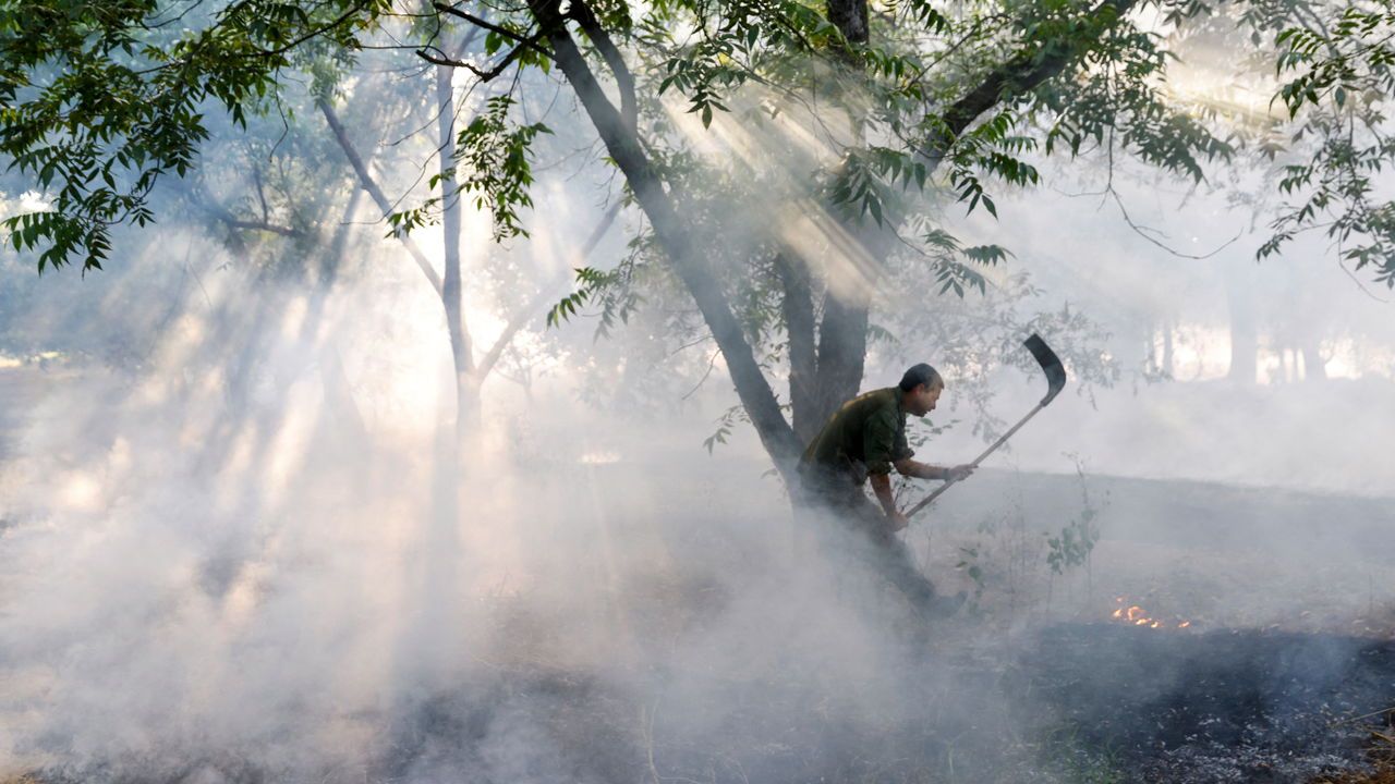 The Israeli first response unit put out flames after rockets were launched from Lebanon into northern Israel.