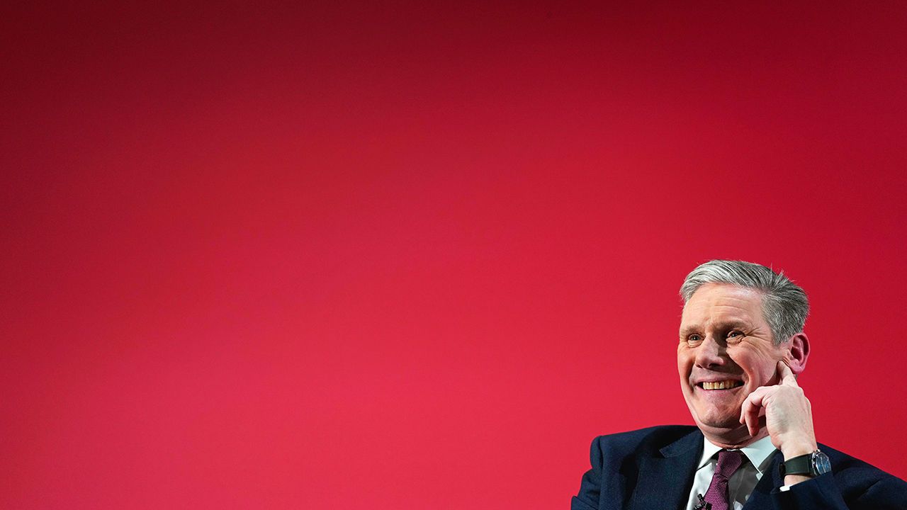 Keir Starmer, Leader of Britain's opposition Labour Party smiles.