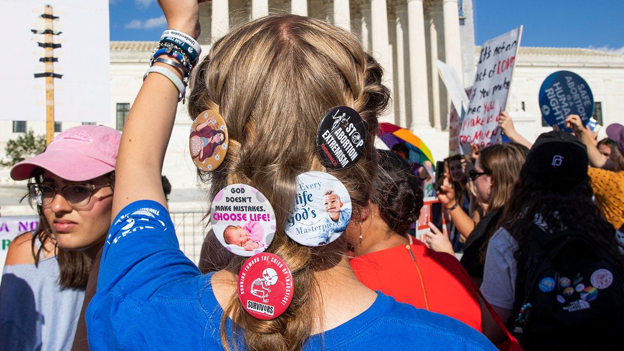 An anti abortion protestor in front of the US Supreme Court, Washington DC