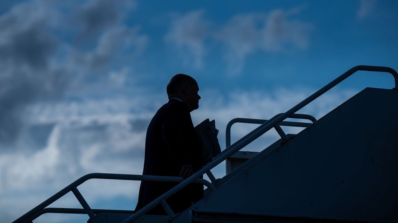 German Chancellor Olaf Scholz boards a plane after the European Political Community summit in Woodstock, UK