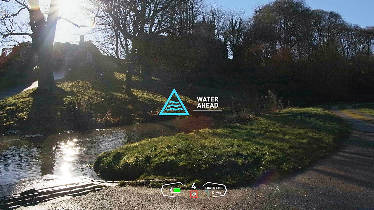 Heads up display on windscreen showing water ahead. 