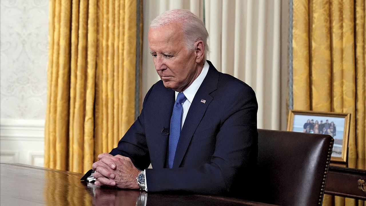 Joe Biden pauses before addressing the nation about his decision to not seek reelection